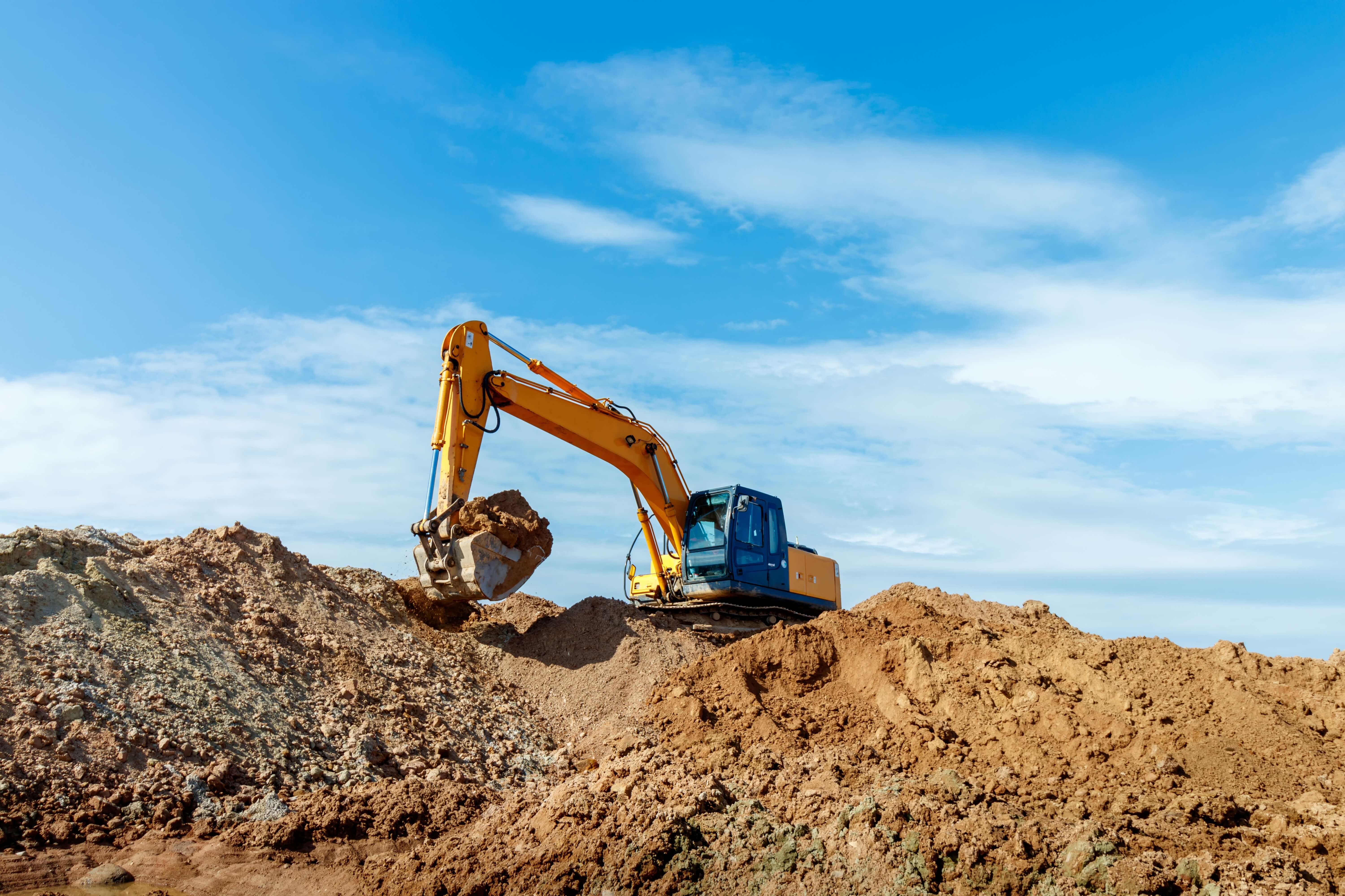 excavator digging on a construction site